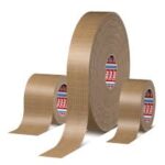 three rolls of tesa reinforced paper tape with fiberglass backing on white background